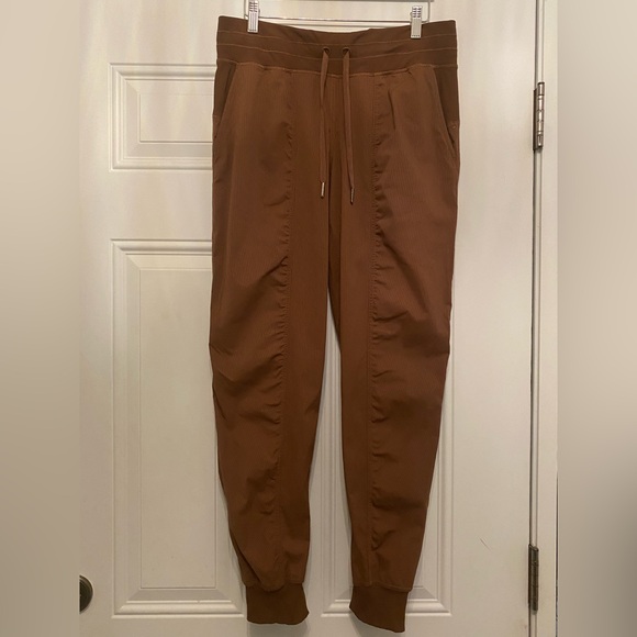 Brown, bone and green Lululemon midrise joggers. Bone has a light lining. Size 8 - Picture 2 of 7